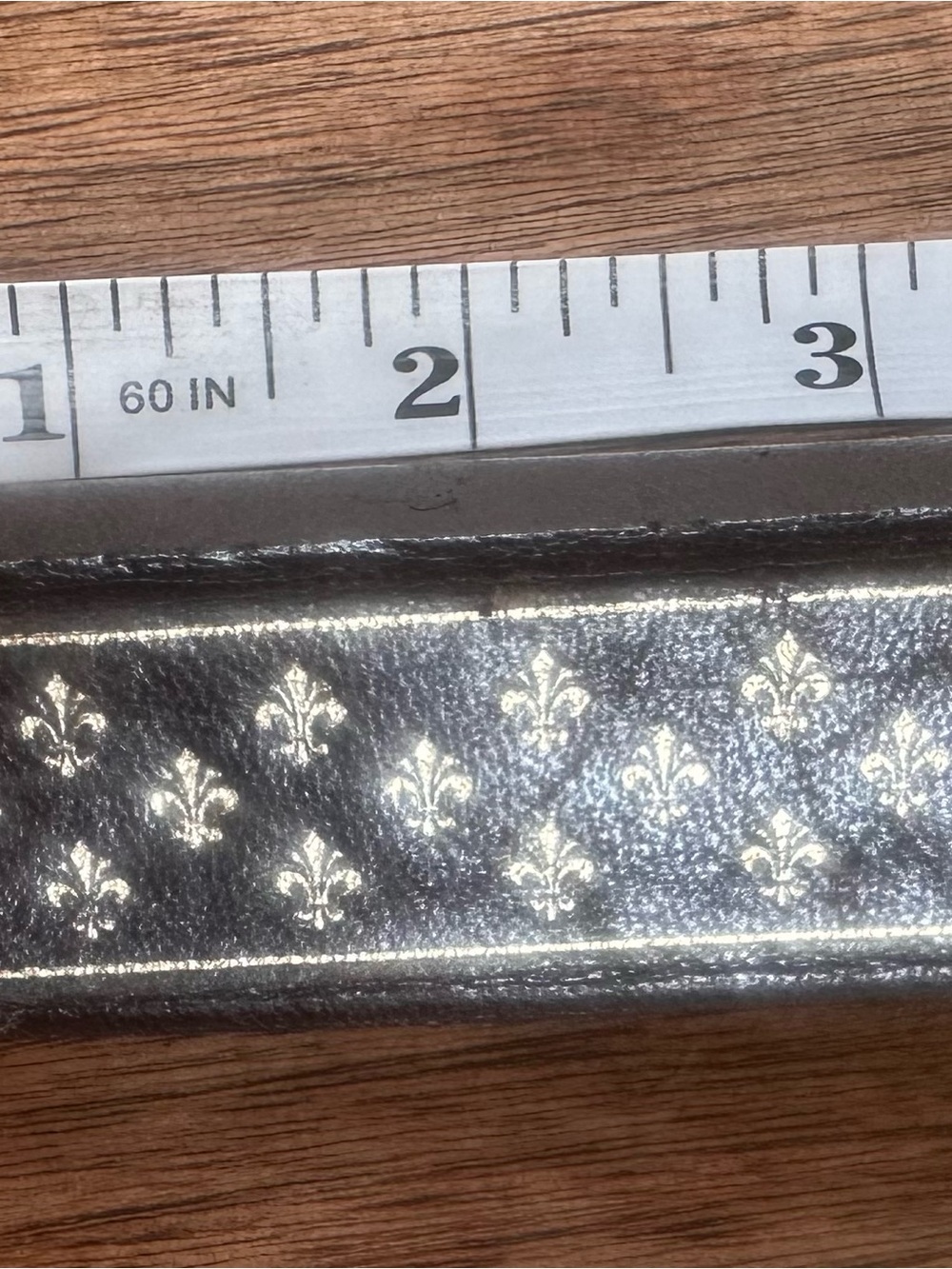 Vintage Italian Florentine Leather lipstick case w/gold Fleur-de-Lys decoration.